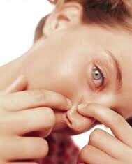 Cómo eliminar los puntos negros de la cara